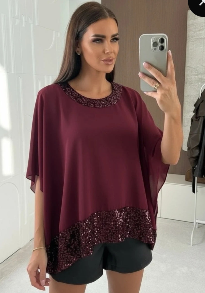 Lös blus med paljettfoder i viskos Vinröd