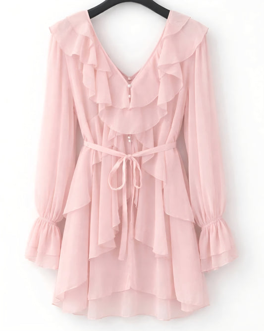 Böljande klänning med volanger Rosa