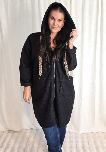 Jacka med dragkedja och huva Svart