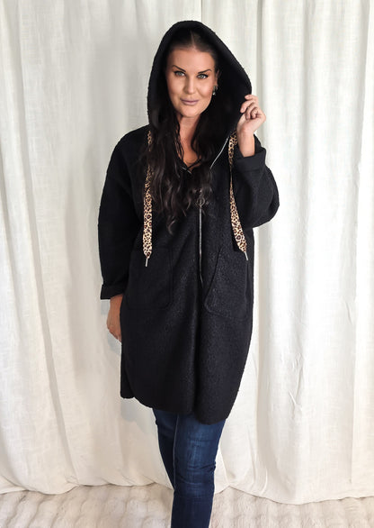 Jacka med dragkedja och huva Svart