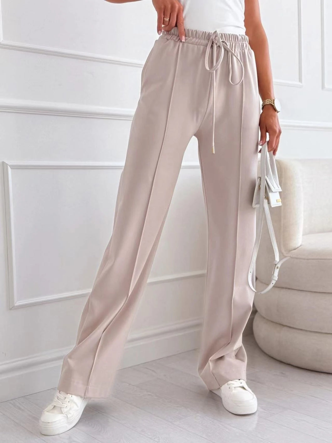 Flytande byxor Beige