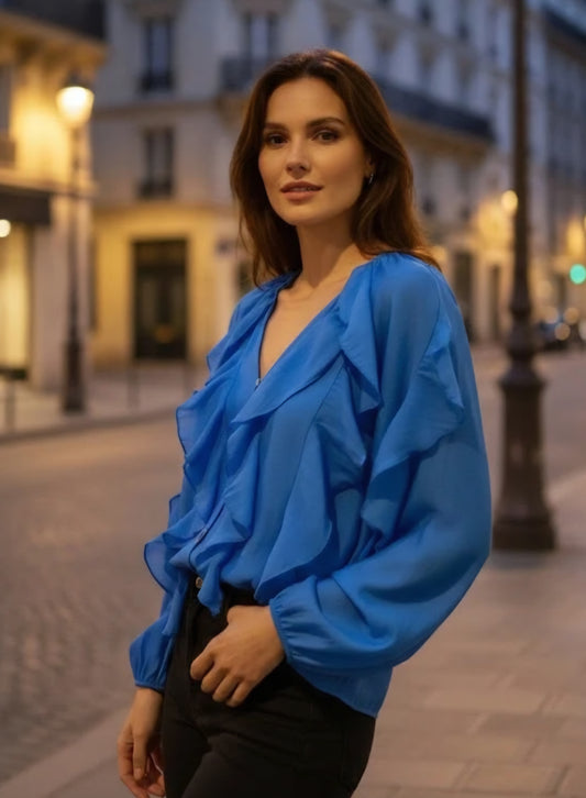 Långärmad blus med volang i lyocell blå