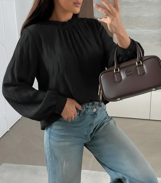Strukturerad blus med volangkrage Svart