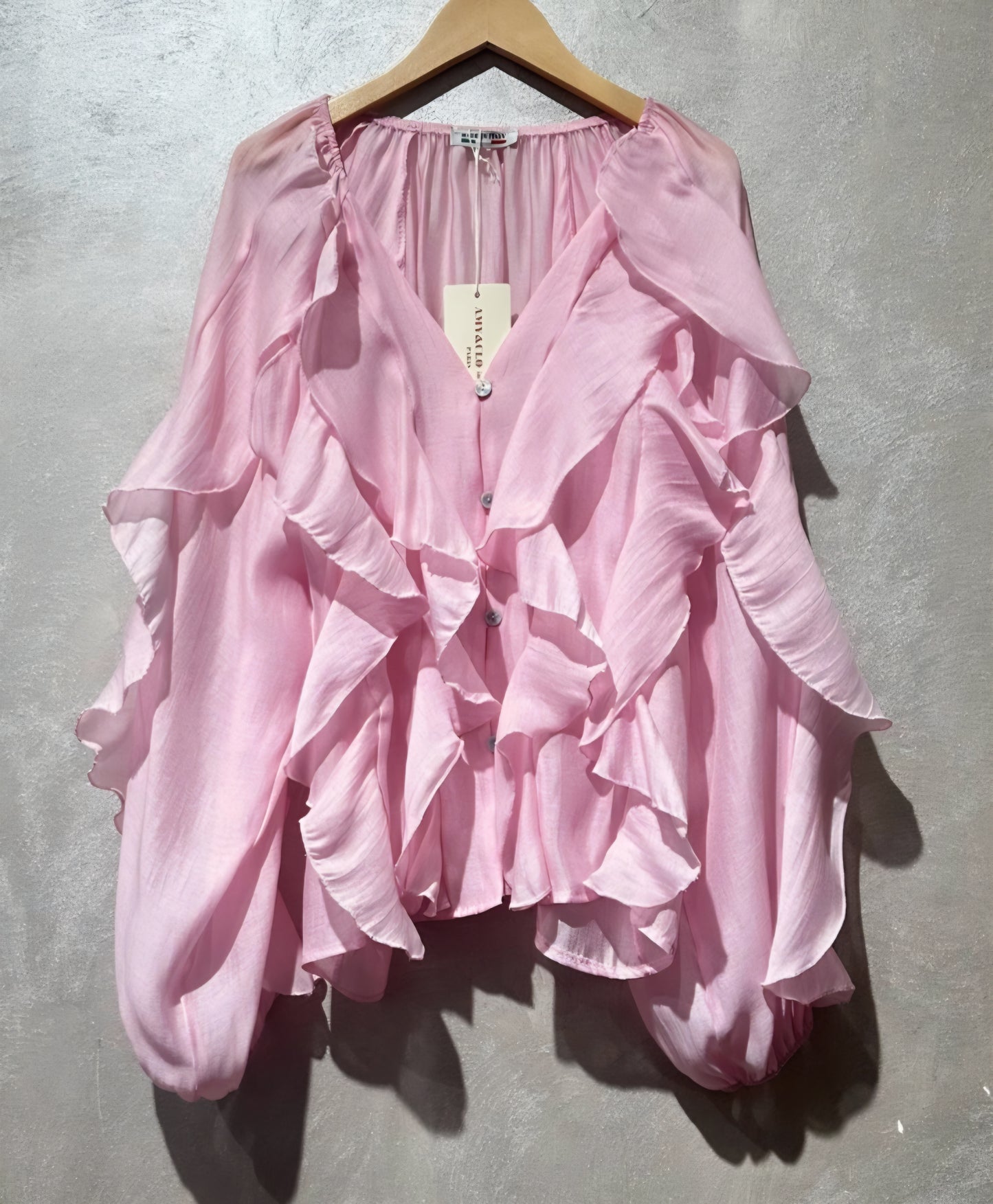 Långärmad blus med volang i lyocell Rosa