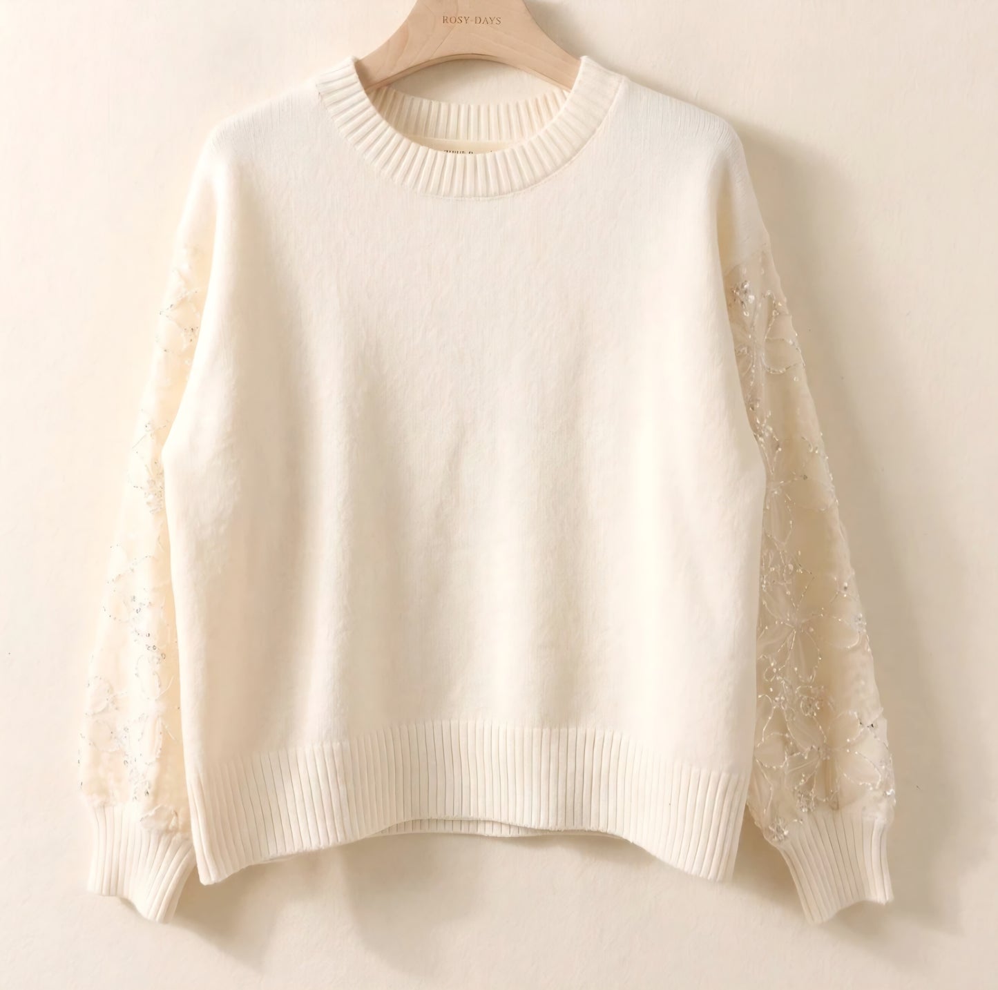 Stickad tröja Med dekorativa armar Offwhite