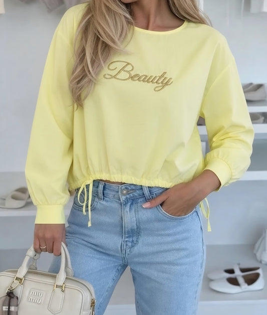 SKÖNHET guldfärgad bomullsblus Gul