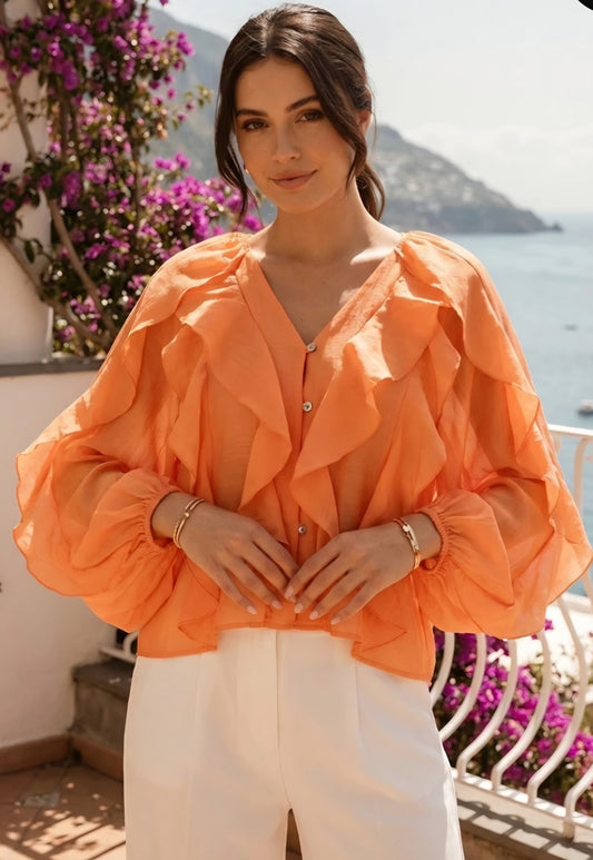 Långärmad blus med volang i lyocell Orange