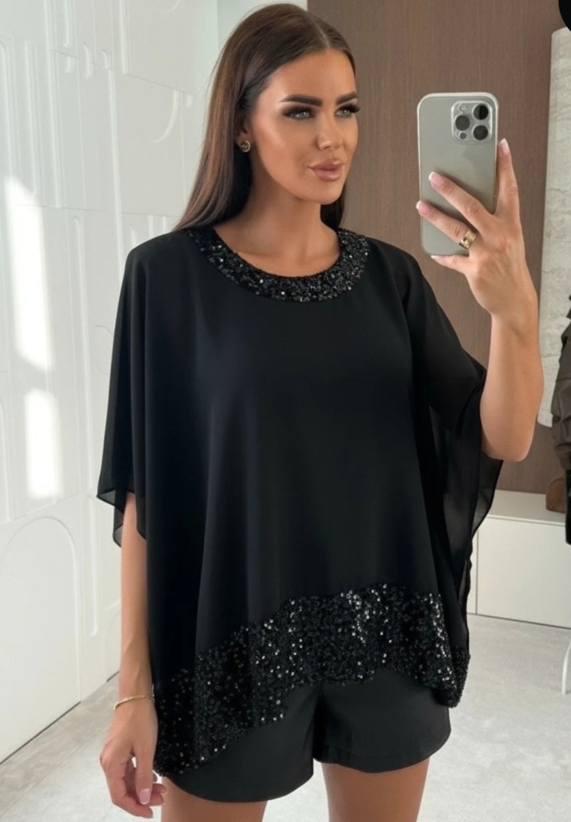 Lös blus med paljettfoder i viskos Svart