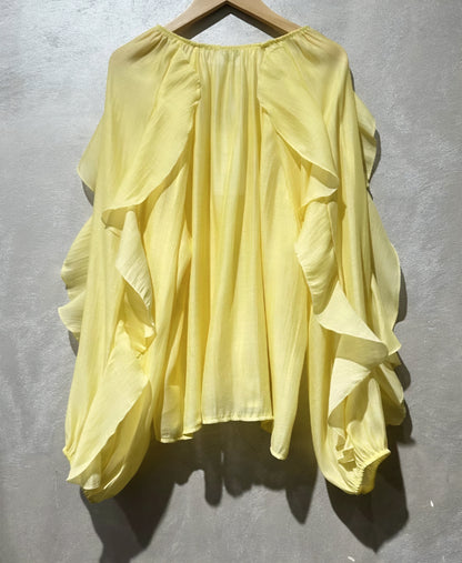 Långärmad blus med volang i lyocell Gul