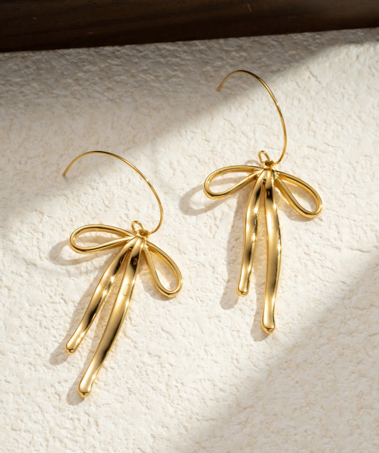 Gyllene öglor med svävande band, Rostfritt stål