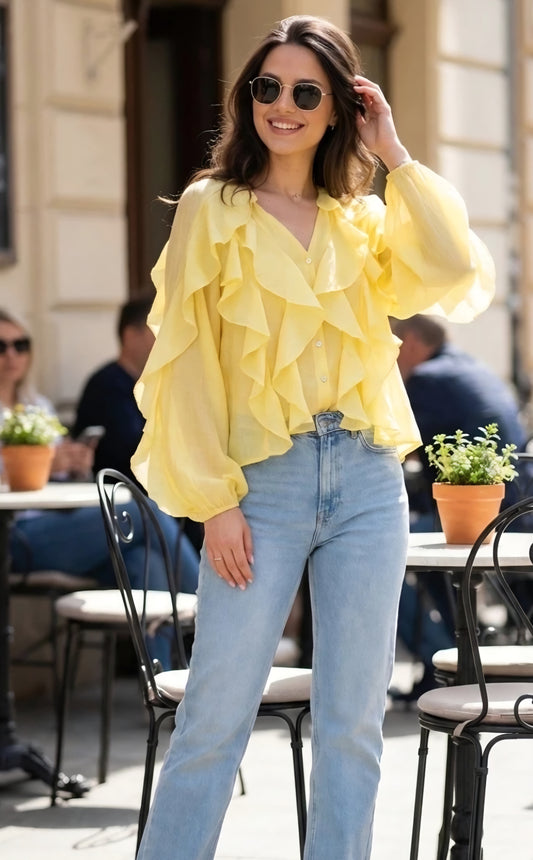 Långärmad blus med volang i lyocell Gul