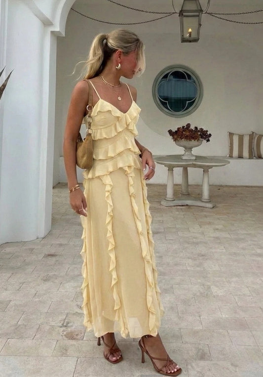 LÅNG KLÄNNING MED VOLANG Gul