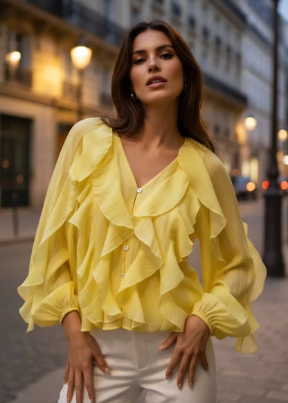 Långärmad blus med volang i lyocell Gul