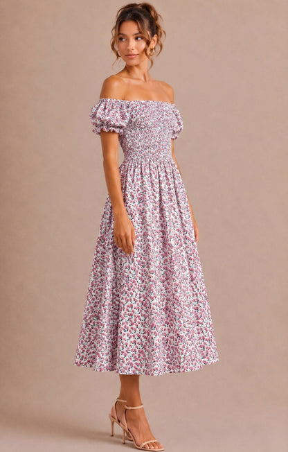 Smockad blommig midiklänning Rosa