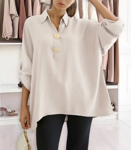 Blus med gyllene knappar Beige