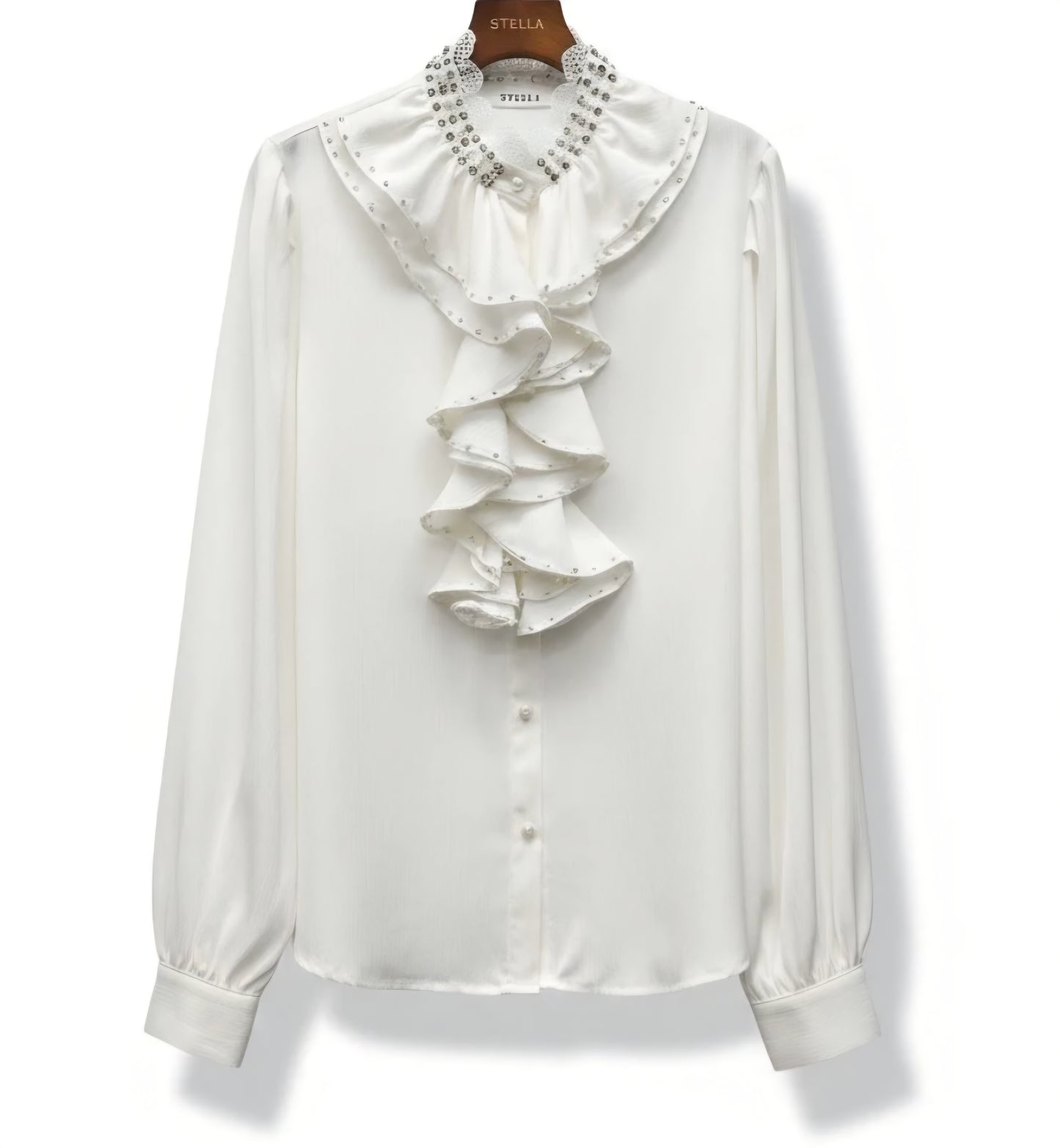 Satinblus med lager på lager av volanger Vit